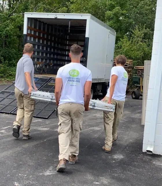 Employees loading work truck with materials in Telford, PA.