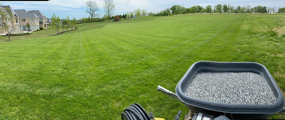 A technician's fertilizer machinery in lawn in Sellersville, PA.